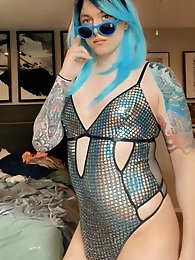 Stunning blue-haired female-presenting individual Deanna in a collection of 98 enticing images