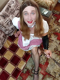 Shemale mistress puts on sexy bra