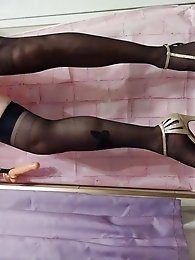 A cross-dressing woman in red attire