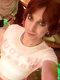 Kellycd2022, the amateur crossdresser, flaunts her seductive charm in a provocative pink bodysuit.