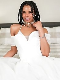 Alluring transgender beauty Kellycd2022 flaunts seductive attire consisting of a tantalizing catsuit paired with heels