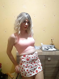 Sissy wearing A Large And Heavy Chastity Cage