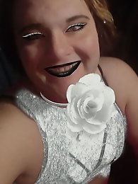 Red hair with a grey dress