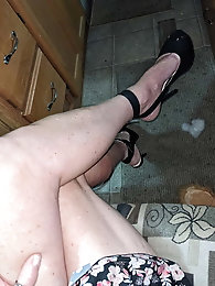 Classy-looking slut is masturbating herself