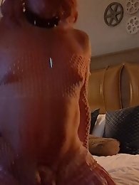 A nice girl in a sexy dress plays a little sissy